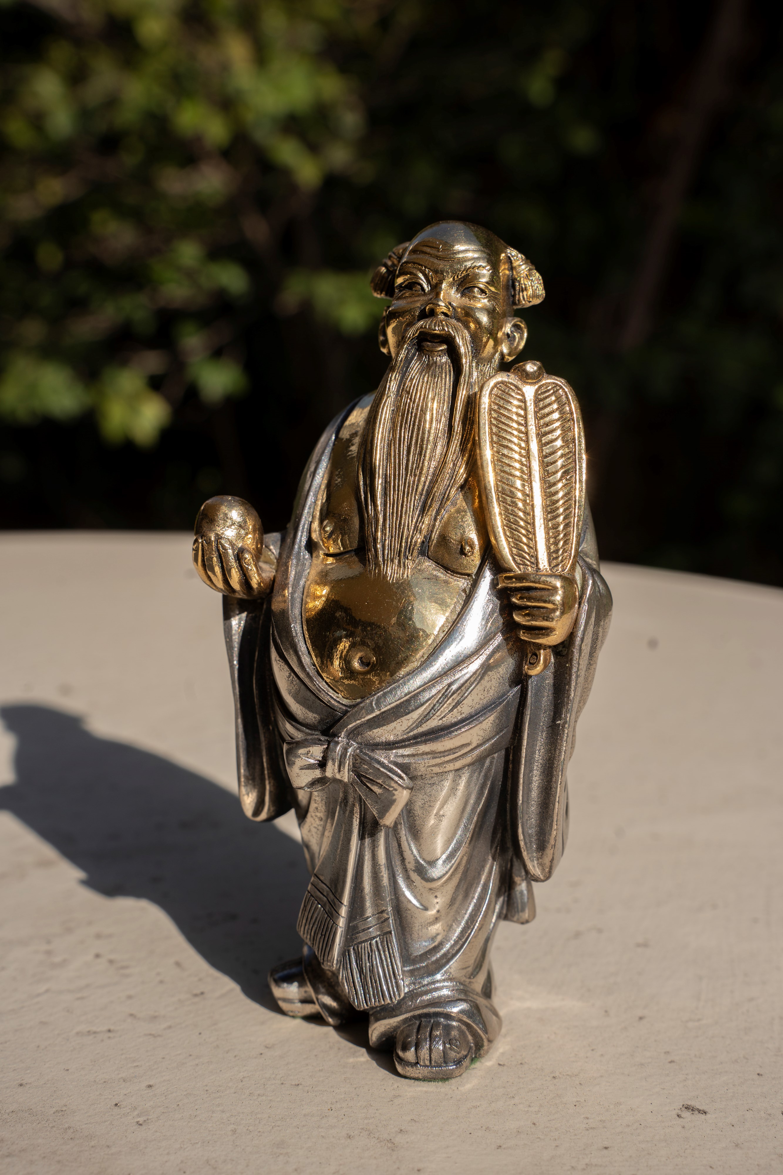 Coppia di figure orientali in lamina di argento 925