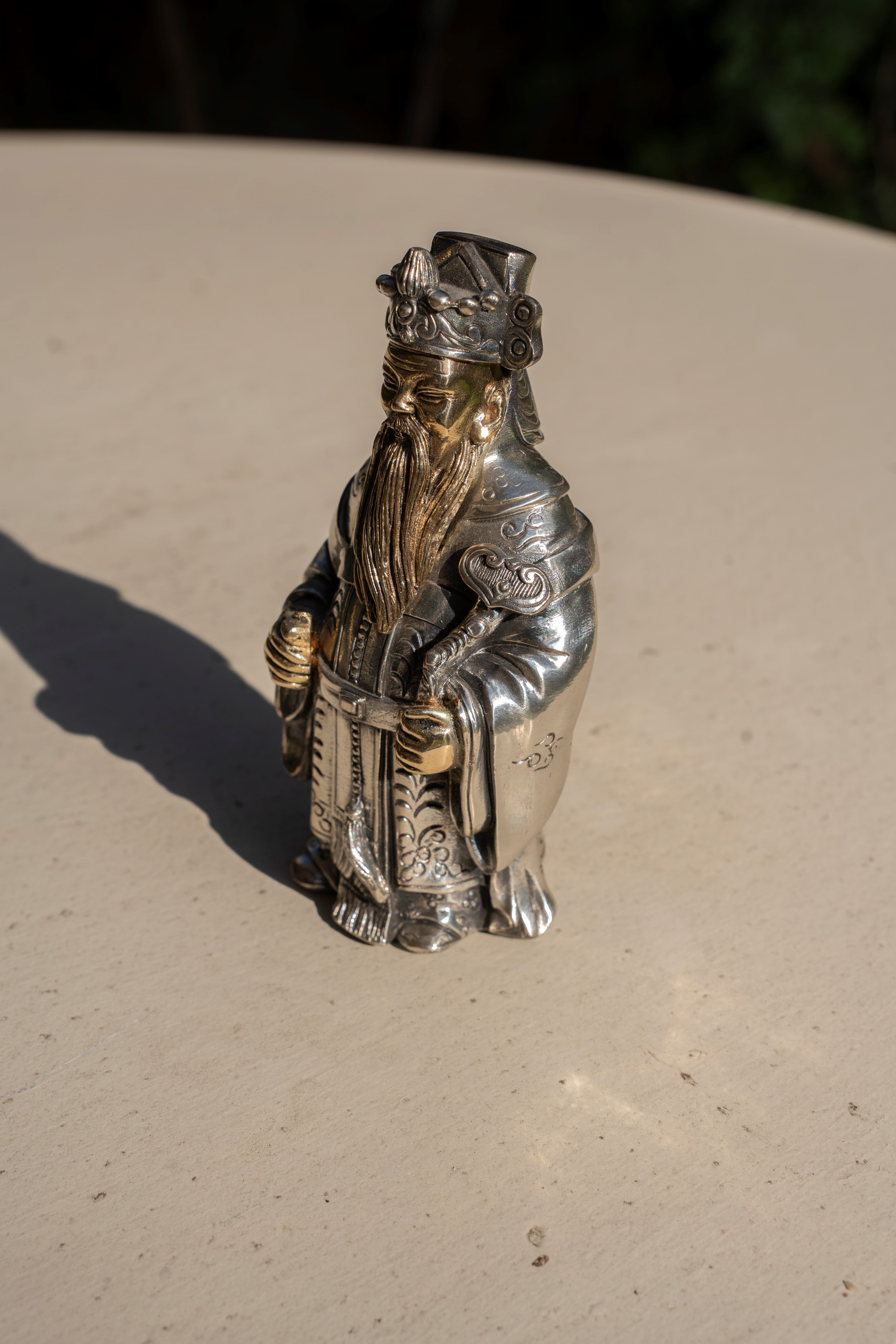 Coppia di figure orientali in lamina di argento 925