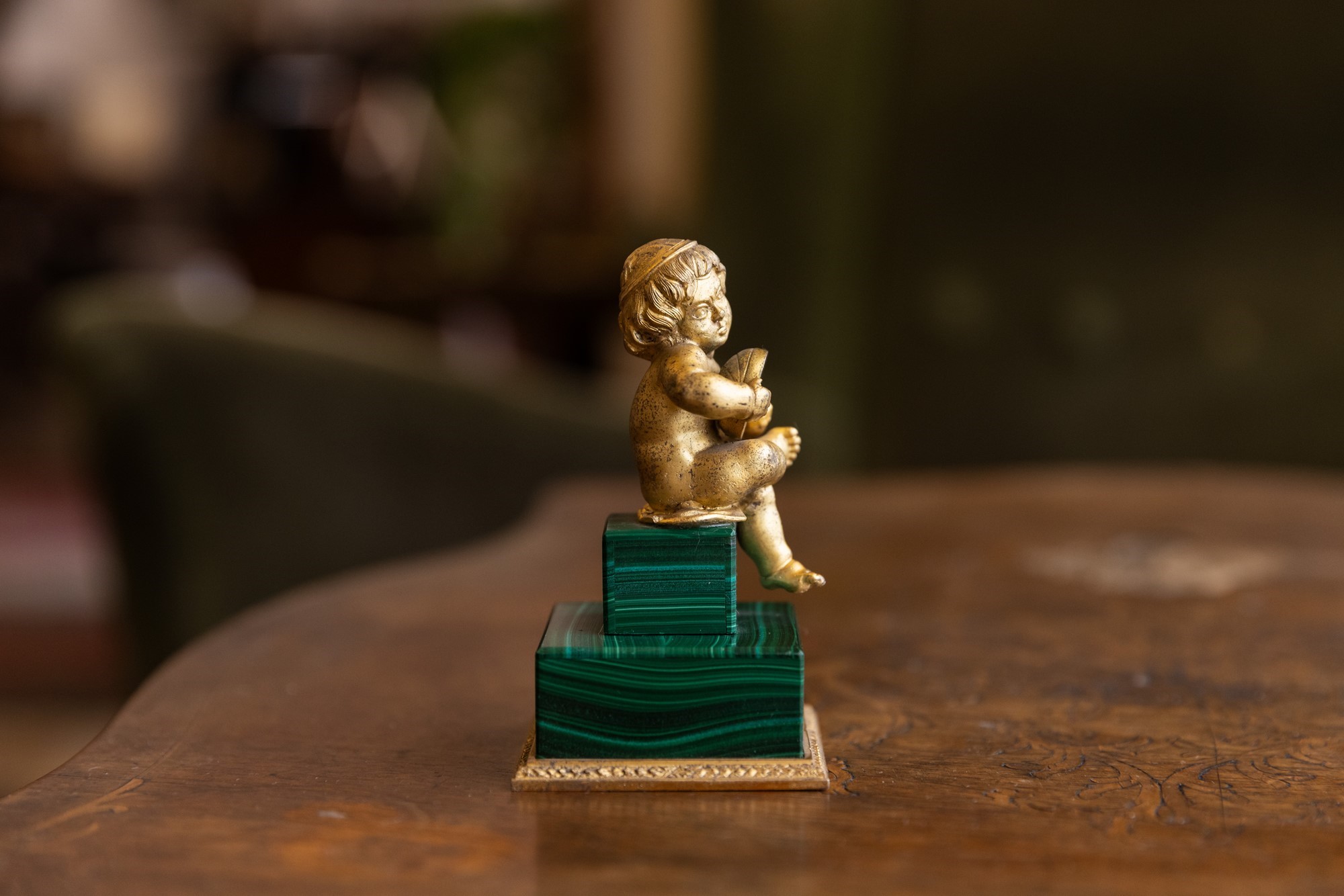 Putto in malachite e bronzo dorato