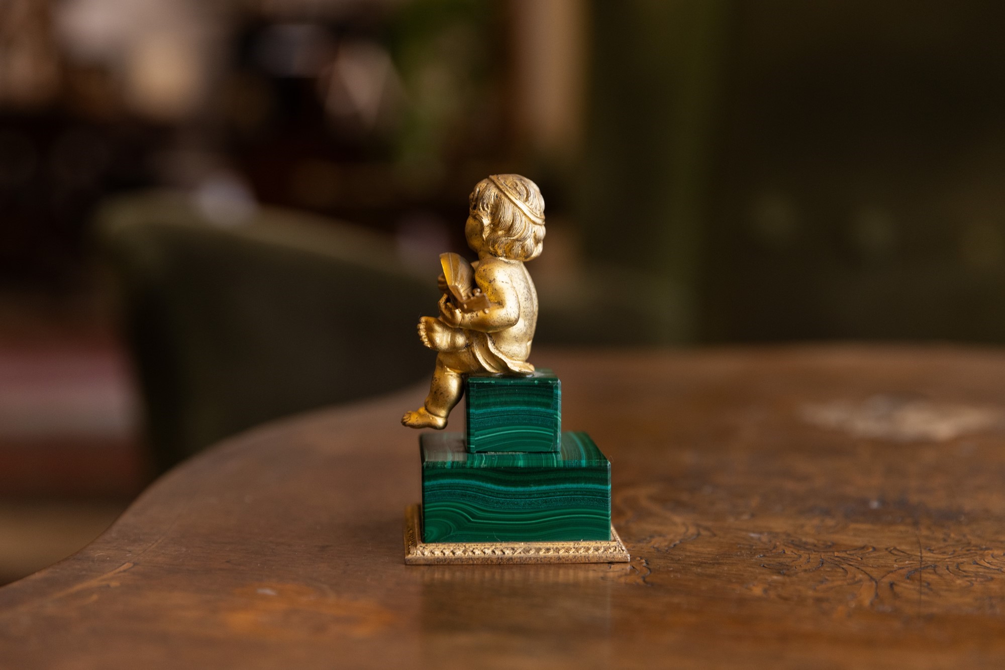 Putto in malachite e bronzo dorato