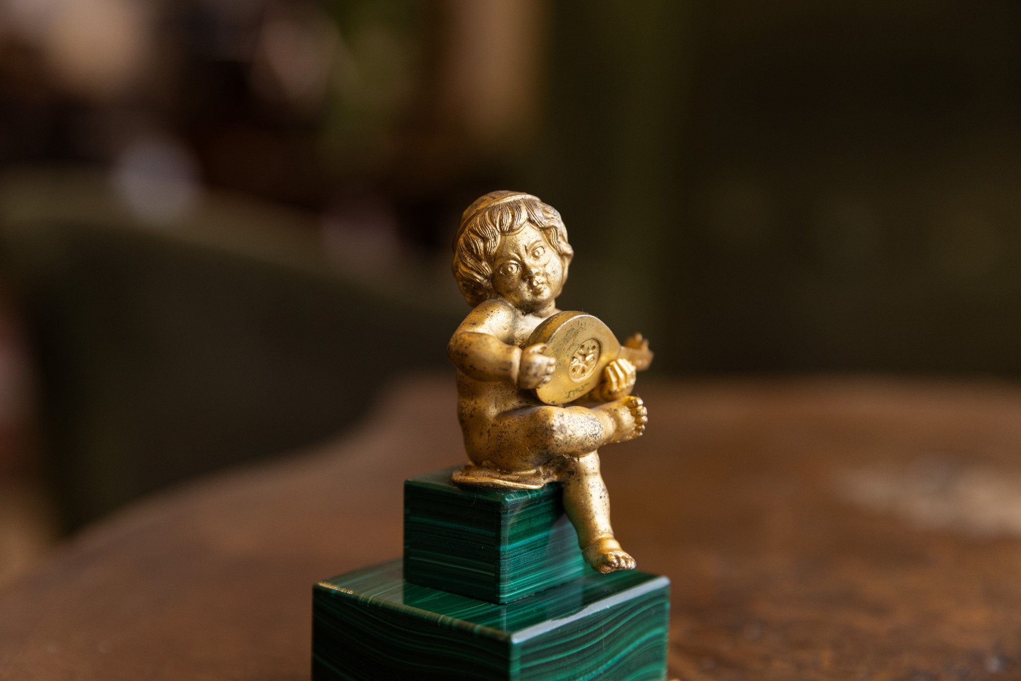 Putto in malachite e bronzo dorato