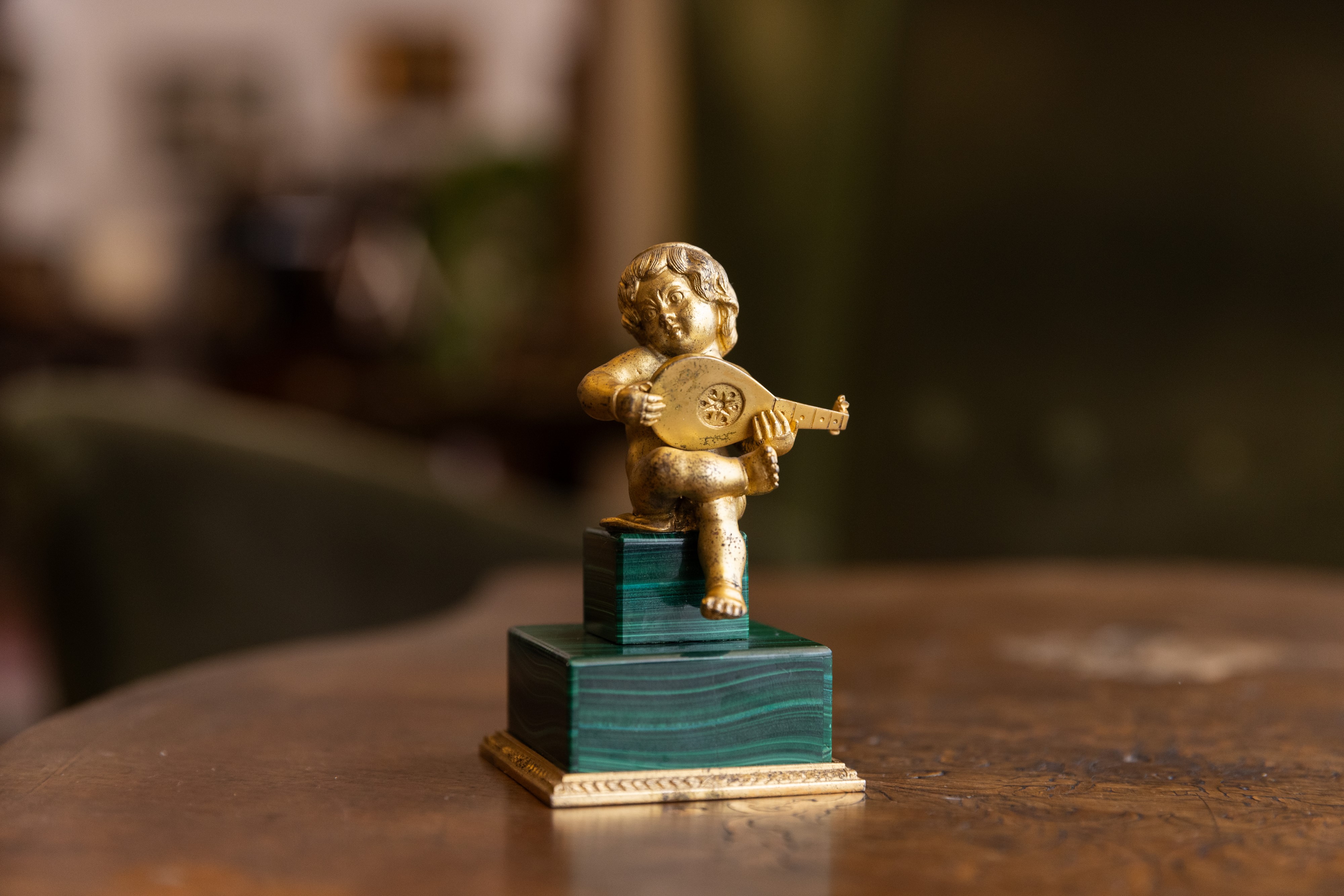 Putto in malachite e bronzo dorato